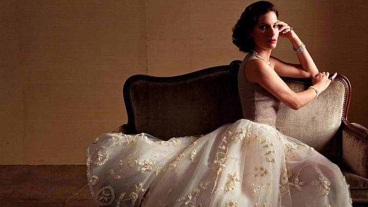 Sandra Bullock Sitting In White Long Dress N Side Pose